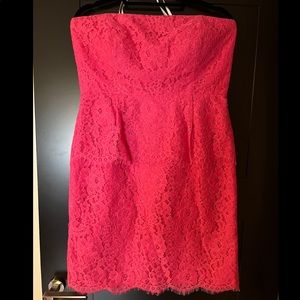 Calvin Klein Strapless Lace Peplum dress in Deep Pink